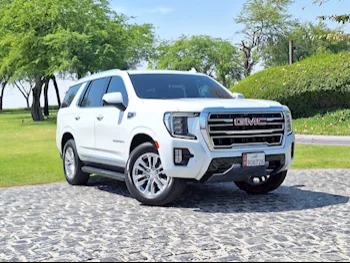 GMC  Yukon  SLT  2023  Automatic  33,000 Km  8 Cylinder  Four Wheel Drive (4WD)  SUV  White  With Warranty
