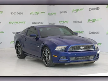Ford  Mustang  GT  2014  Automatic  39,000 Km  8 Cylinder  Rear Wheel Drive (RWD)  Coupe / Sport  Blue