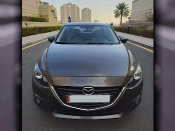 Mazda  Mazda 3  2015  Automatic  117,000 Km  4 Cylinder  Front Wheel Drive (FWD)  Classic  Gray