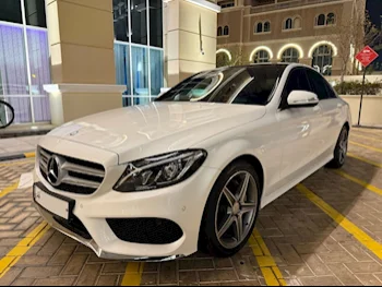 Mercedes-Benz  C-Class  200 AMG  2015  Automatic  95,000 Km  4 Cylinder  Rear Wheel Drive (RWD)  Sedan  White