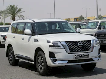 Nissan  Patrol  Titanium  2023  Automatic  8,000 Km  6 Cylinder  Four Wheel Drive (4WD)  SUV  White  With Warranty