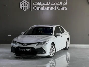 Toyota  Camry  GLE  2023  Automatic  48,000 Km  4 Cylinder  Front Wheel Drive (FWD)  Sedan  White  With Warranty
