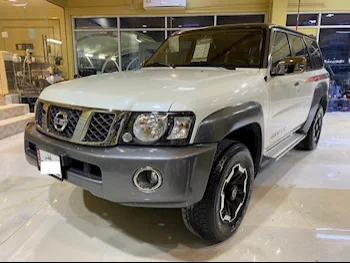 Nissan  Patrol  Super Safari  2022  Automatic  20,000 Km  6 Cylinder  Four Wheel Drive (4WD)  SUV  White  With Warranty