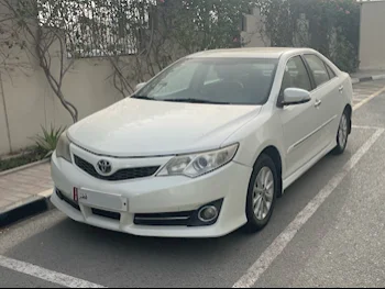 تويوتا  كامري  جي ال اكس  2013  اوتوماتيك  160,000 كم  4 سلندر  سحب امامي  سيدان  أبيض