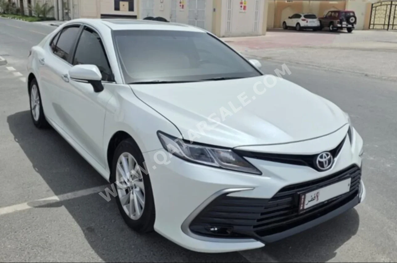 Toyota  Camry  GLE  2023  Automatic  91,501 Km  4 Cylinder  Front Wheel Drive (FWD)  Sedan  White  With Warranty