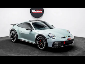 Porsche  911  Dakar  2023  Automatic  6,175 Km  6 Cylinder  Rear Wheel Drive (RWD)  Coupe / Sport  Green