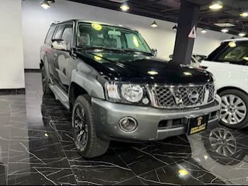 Nissan  Patrol  Super Safari  2023  Manual  54,000 Km  6 Cylinder  Four Wheel Drive (4WD)  SUV  Black  With Warranty