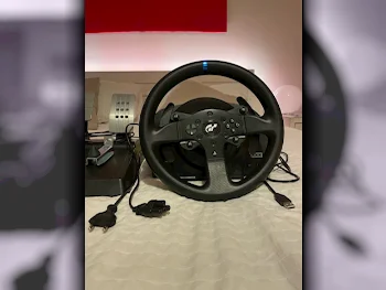 ملحقات اجهزة العاب الفيديو عجلة القيادة مع مغير السرع  - سوني  - بلاي ستيشن 5  - أسود