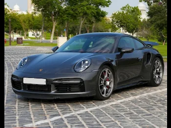 بورش  911  توربو  2023  اوتوماتيك  16,800 كم  6 سلندر  دفع خلفي  كوبيه \ سبورت  رمادي  تحت الضمان