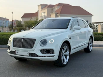 بنتلي  بينتايجا  2018  اوتوماتيك  29,000 كم  12 سلندر  دفع رباعي  اس يو في  أبيض