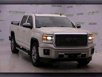 جي ام سي  سييرا  دينالي  2015  اوتوماتيك  185,000 كم  8 سلندر  دفع رباعي  بيكب  أبيض لؤلؤي