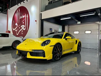Porsche  911  Turbo S  2023  Automatic  7,000 Km  6 Cylinder  Rear Wheel Drive (RWD)  Coupe / Sport  Yellow