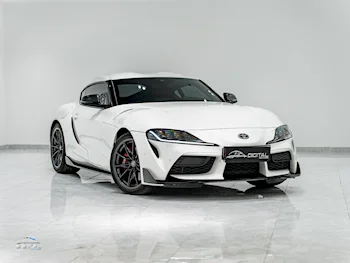 Toyota  Supra  GR  2023  Automatic  61,000 Km  6 Cylinder  Rear Wheel Drive (RWD)  Coupe / Sport  White  With Warranty