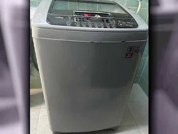 غسالة ملابس & الكل في واحد ال جي \  غسالة تحميل علوي  اللون الرمادي