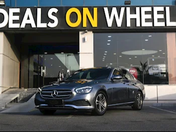 Mercedes-Benz  E-Class  200  2021  Automatic  75,000 Km  4 Cylinder  Rear Wheel Drive (RWD)  Sedan  Gray