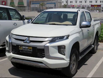 Mitsubishi  L 200  Diesel  2020  Manual  144,000 Km  4 Cylinder  Four Wheel Drive (4WD)  Pick Up  White