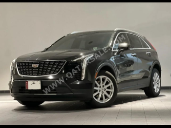 Cadillac  XT4  2023  Automatic  53,800 Km  4 Cylinder  All Wheel Drive (AWD)  SUV  Black  With Warranty