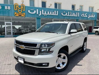 Chevrolet  Tahoe  LT  2015  Automatic  187,000 Km  8 Cylinder  Four Wheel Drive (4WD)  SUV  White
