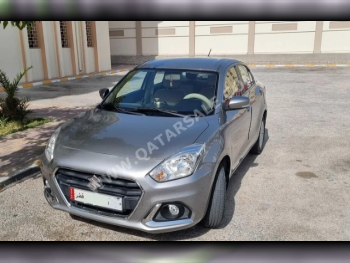 Suzuki  Dzire  2022  Automatic  39,000 Km  4 Cylinder  Front Wheel Drive (FWD)  Sedan  Light Gray