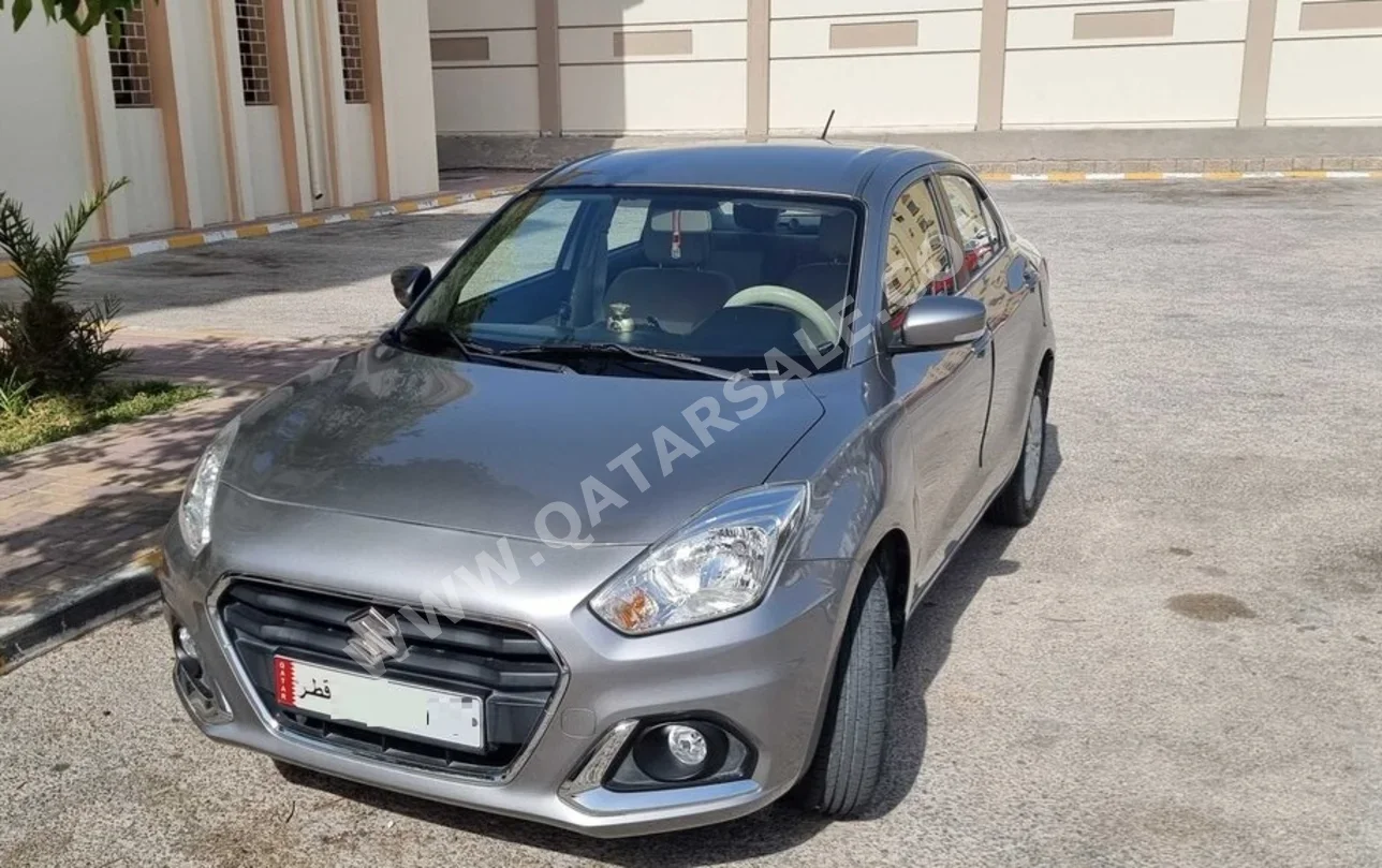 Suzuki  Dzire  2022  Automatic  39,000 Km  4 Cylinder  Front Wheel Drive (FWD)  Sedan  Light Gray