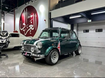 Mini  Cooper  1995  Manual  87,000 Km  4 Cylinder  Front Wheel Drive (FWD)  Classic  Green  With Warranty