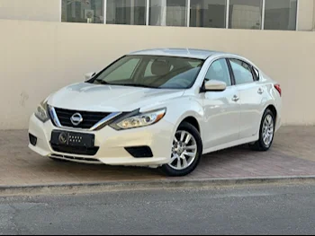 Nissan  Altima  2.5 S  2017  Automatic  128,000 Km  4 Cylinder  Front Wheel Drive (FWD)  Sedan  White