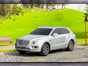 بنتلي  بينتايجا  2018  اوتوماتيك  76,200 كم  12 سلندر  دفع رباعي  اس يو في  فضي