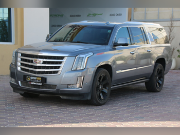 Cadillac  Escalade  Platinum  2018  Automatic  90,500 Km  8 Cylinder  Four Wheel Drive (4WD)  SUV  Light Sky Blue