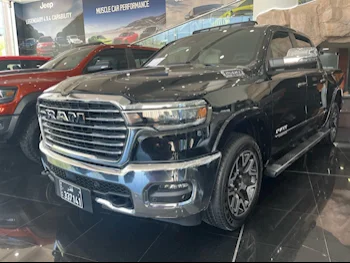 Dodge  Ram  1500 Laramie  2025  Automatic  14,500 Km  6 Cylinder  Four Wheel Drive (4WD)  Pick Up  Black  With Warranty