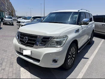 Nissan  Patrol  Platinum  2014  Automatic  230,000 Km  8 Cylinder  Four Wheel Drive (4WD)  SUV  White