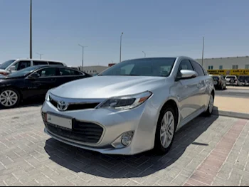 Toyota  Avalon  XLE  2014  Automatic  137,000 Km  6 Cylinder  Front Wheel Drive (FWD)  Sedan  Silver