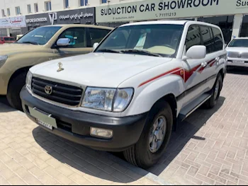 Toyota  Land Cruiser  GXR  1999  Automatic  545,000 Km  6 Cylinder  Four Wheel Drive (4WD)  SUV  White