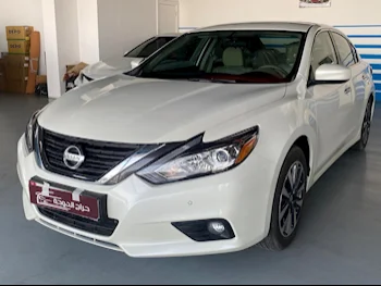 Nissan  Altima  2017  Automatic  4,000 Km  4 Cylinder  Front Wheel Drive (FWD)  Sedan  White  With Warranty