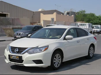 Nissan  Altima  2017  Automatic  187,000 Km  4 Cylinder  Front Wheel Drive (FWD)  Sedan  White