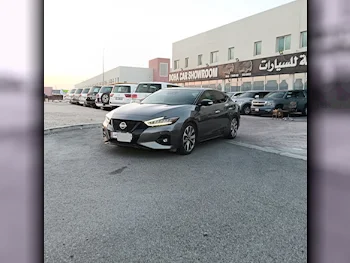 Nissan  Maxima  2022  Automatic  41,000 Km  6 Cylinder  Rear Wheel Drive (RWD)  Sedan  Gray