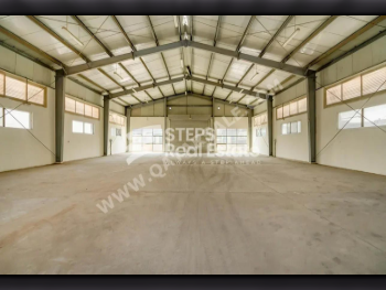 مخازن و مستودعات - الريان  - المنطقة الصناعية  -المساحة: 4000 متر مربع