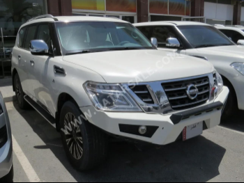 Nissan  Patrol  Titanium  2017  Automatic  341,000 Km  8 Cylinder  Four Wheel Drive (4WD)  SUV  White