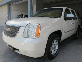 GMC  Yukon  2013  Automatic  155,000 Km  8 Cylinder  Four Wheel Drive (4WD)  SUV  White
