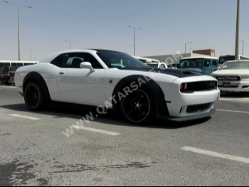 Dodge  Challenger  SRT  2017  Automatic  128,000 Km  8 Cylinder  Rear Wheel Drive (RWD)  Coupe / Sport  White