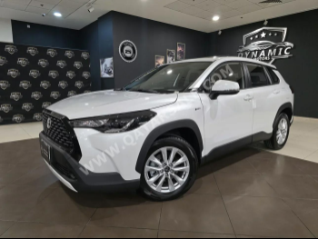 تويوتا  كورولا  كروس هايبرد  2025  اوتوماتيك  0 كم  4 سلندر  دفع رباعي  اس يو في  أبيض  تحت الضمان