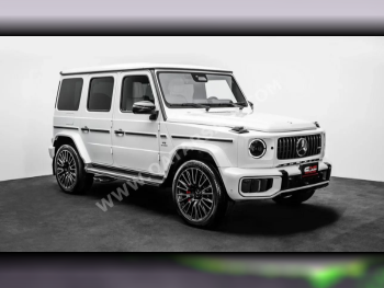 مرسيدس - بنز  جي - كلاس  63 اي ام جي  2025  اوتوماتيك  145 كم  8 سلندر  دفع رباعي  اس يو في  أبيض  تحت الضمان