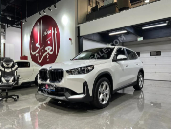 BMW  IX  1  2025  Automatic  1,000 Km  4 Cylinder  Four Wheel Drive (4WD)  SUV  White  With Warranty