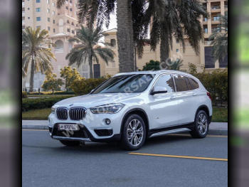 BMW  X-Series  X1  2016  Automatic  83,000 Km  4 Cylinder  Four Wheel Drive (4WD)  SUV  White