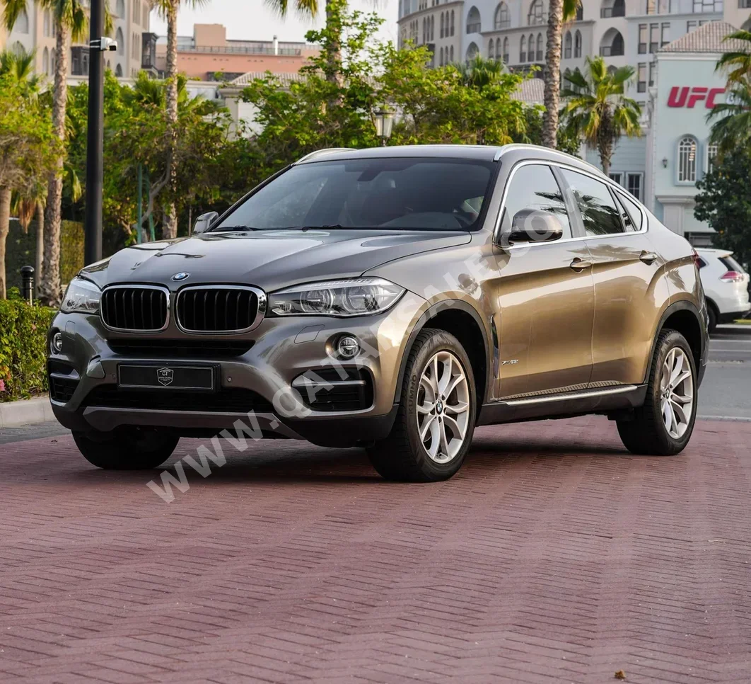 BMW  X-Series  X6  2017  Automatic  65,000 Km  6 Cylinder  Four Wheel Drive (4WD)  SUV  Gold
