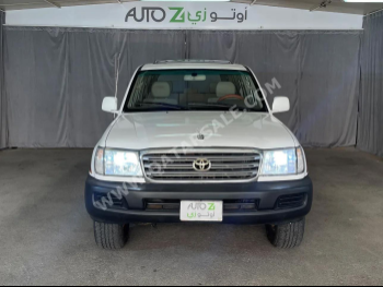 Toyota  Land Cruiser  GX  2005  Automatic  390,000 Km  6 Cylinder  Four Wheel Drive (4WD)  SUV  White