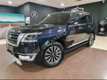 Nissan  Patrol  Titanium  2021  Automatic  13,000 Km  8 Cylinder  Four Wheel Drive (4WD)  SUV  Blue  With Warranty