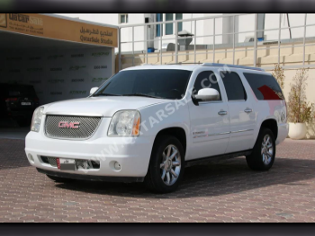 جي ام سي  يوكون  دينالي  2009  اوتوماتيك  130,000 كم  8 سلندر  دفع رباعي  اس يو في  أبيض