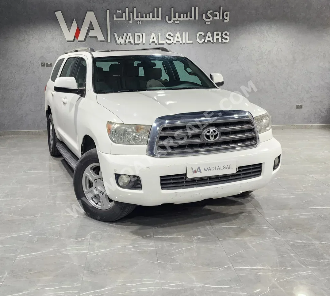 Toyota  Sequoia  2014  Automatic  297,000 Km  8 Cylinder  Four Wheel Drive (4WD)  SUV  White