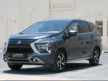Mitsubishi  Xpander  2024  Automatic  56,000 Km  4 Cylinder  Front Wheel Drive (FWD)  SUV  Gray  With Warranty