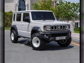 سوزوكي  جمني  2024  اوتوماتيك  12,000 كم  4 سلندر  دفع رباعي  اس يو في  أبيض  تحت الضمان